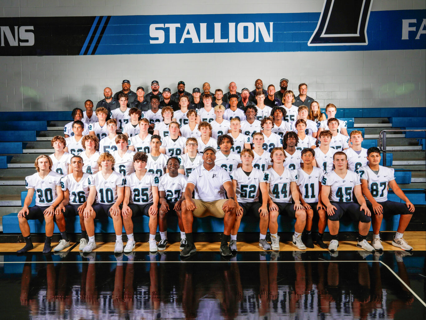 A team photo capturing the unity and camaraderie of a football team.