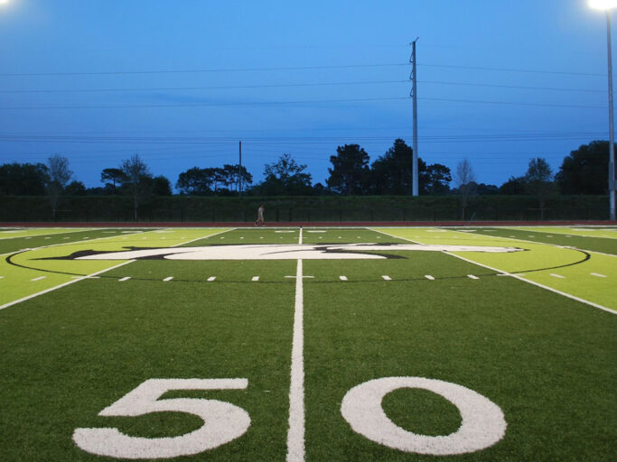 An initiatives-themed football field with the number 50 on it.