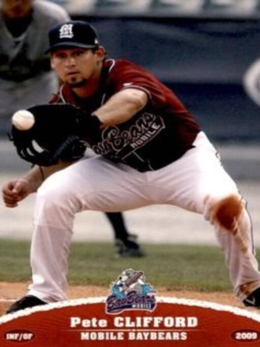 A pro baseball player is catching a ball.