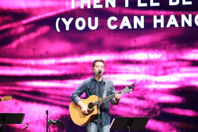 Demi Tebow performs a captivating acoustic guitar solo at Special Chapel.