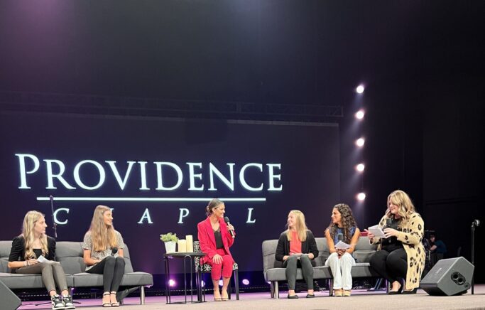 A group of Special women on stage at the Providence Chapel event.