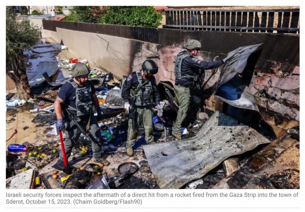 policemen standing in a pile of rubble, providing support and outreach in the aftermath of a israeli conflict.