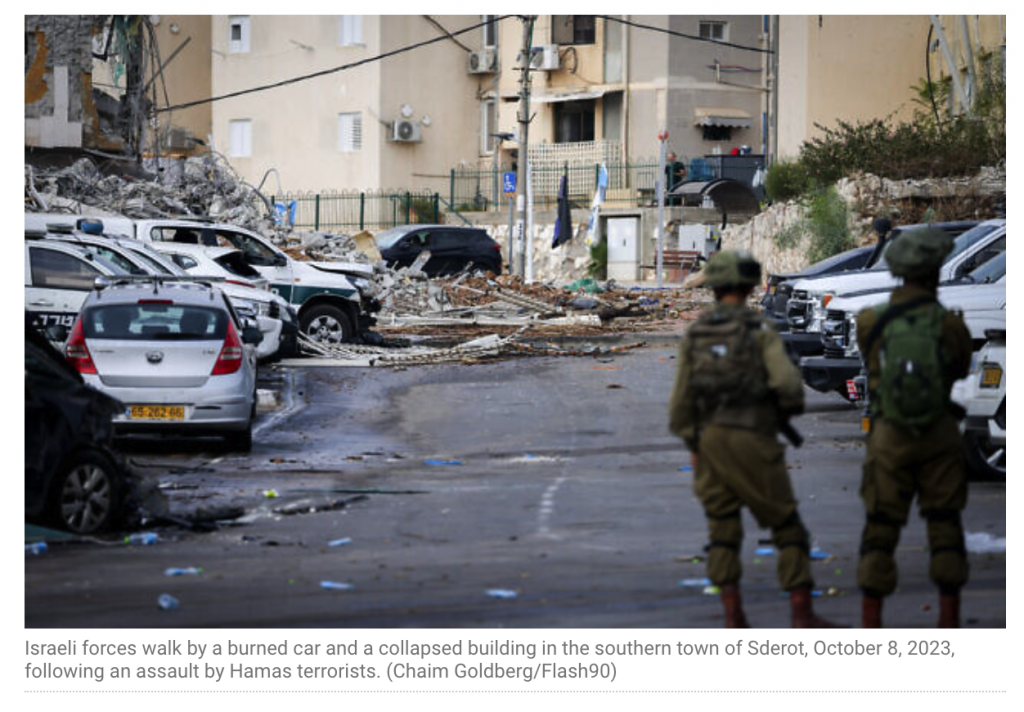 Israeli soldiers conduct outreach and support missions as they walk through the rubble of a city.