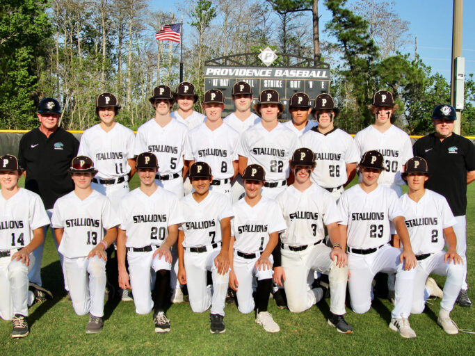 A baseball team posing for a picture.