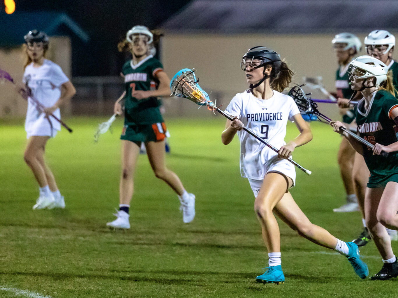 Girls playing lacrosse