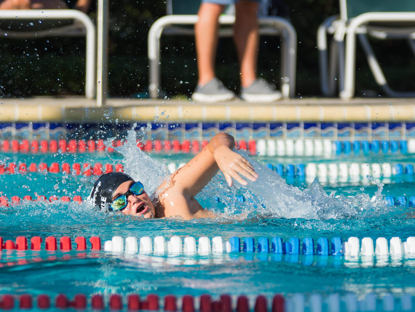 A man is swimming.